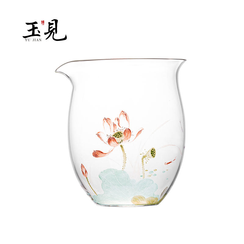 Hand-painted floral glass tea pitcher with orange lily blossoms and soft blue-green foliage.