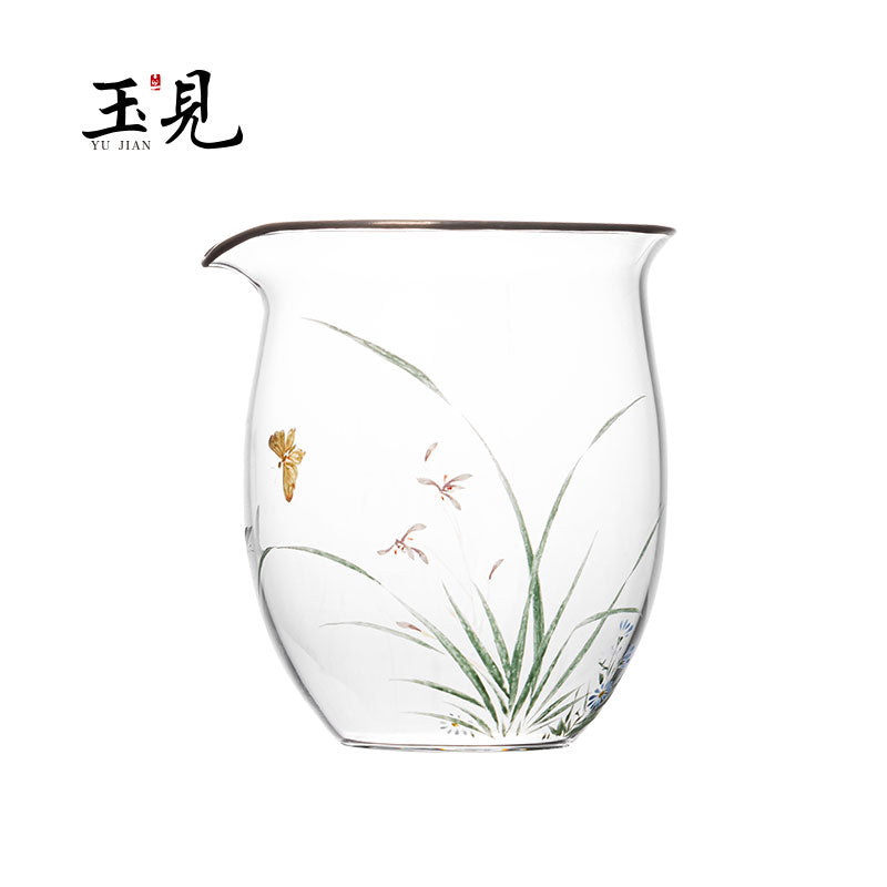 Hand-painted floral glass tea pitcher with green grass strokes and small gold flower details.